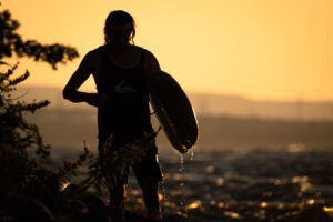 Surfer silhouette at vague a guy in Montreal Quebec Canada